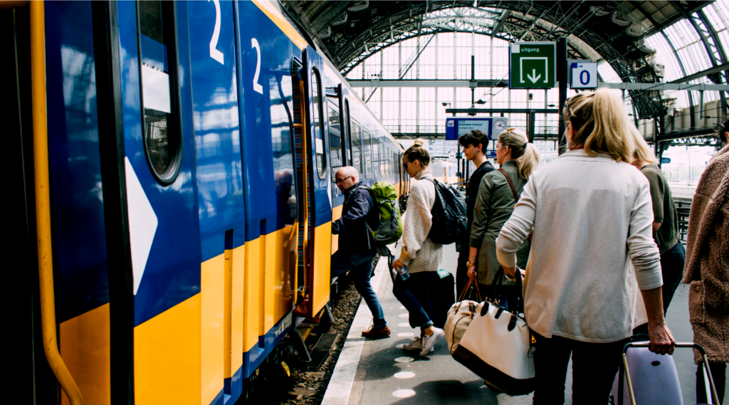 people boarding a train